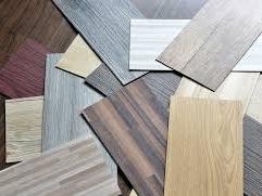 Rigid core flooring base